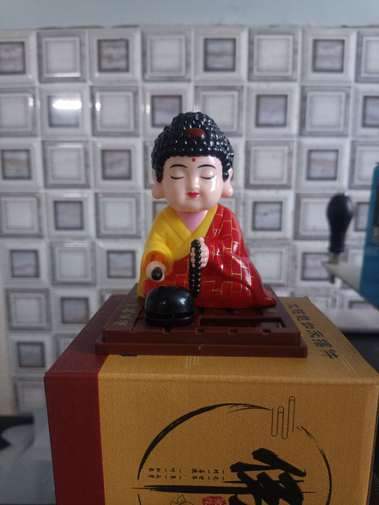 SOLAR POWERED PRAYING BUDDHA STATUE