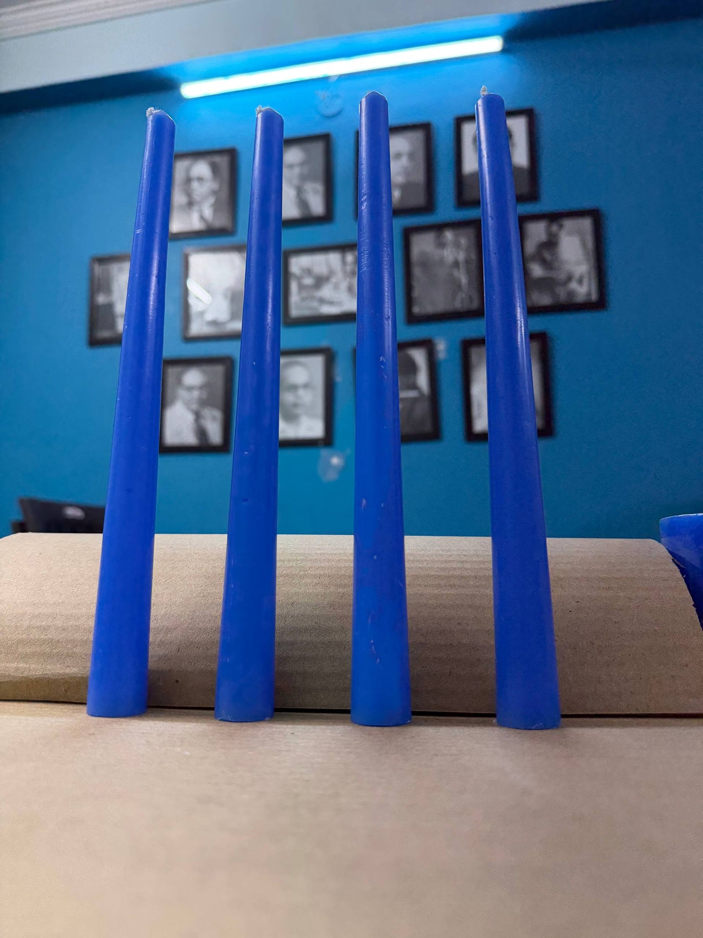 Set of 4 blue taper candle